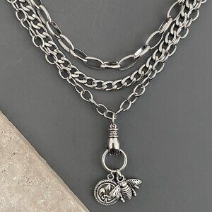 NEW , layered silver tone necklace set, HAND BEE FLEUR DE LIS edgy french